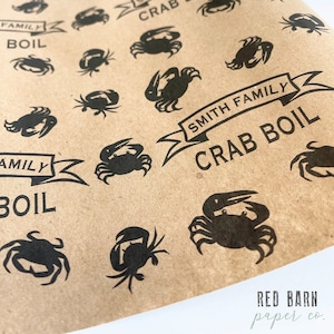 May include: Brown paper wrapping paper with a repeating pattern of black crabs and the text "Smith Family Crab Boil". The paper is from Red Barn Paper Co.