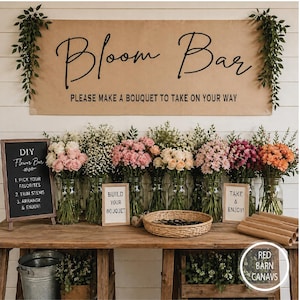 May include: A flower bar display with a sign that reads "Bloom Bar" and "Please make a bouquet to take on your way." Various flowers in glass jars are arranged on a wooden table, with signs that say "Build Your Bouquet" and "Take & Enjoy!"