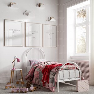 May include: A white metal bed frame with a red and pink patchwork quilt and a red throw blanket. There are three framed pictures on the wall behind the bed, each with the text "Your Design Here".
