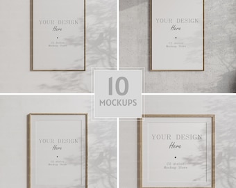 May include: Four wood framed mockups on a white background. Each frame has a light wood frame and a white mat. The text "YOUR DESIGN Here" is in the center of each frame. The text "C2 Atelier Mockup Store" is below the text "YOUR DESIGN Here".