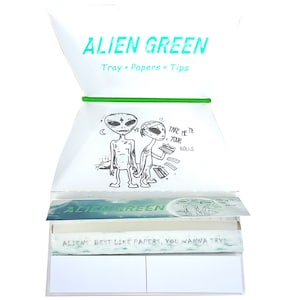 May include: A white box with a green elastic band. The box has a drawing of two aliens on it. The text on the box says "Alien Green Tray + Papers + Tips" and "Take me to your rolls". The box also has the text "Alien Green" and "Aliens' best like papers, you wanna try?"