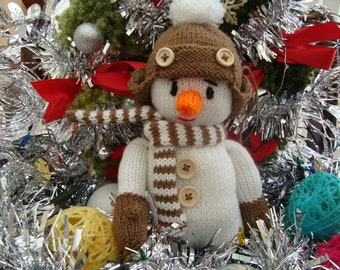 Samuel the Flying Snowman hand knitted in various yarns