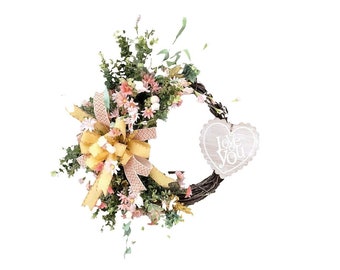 Orange, coral, white and green floral grapevine everyday "Love You" wreath.