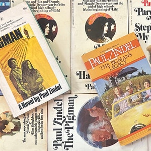 May include: A collection of paperback books by author Paul Zindel, featuring titles like "The Pigman", "The Pigman's Legacy", and "Pardon Me, You're Stepping On My Eyeball!" The books have yellow, orange, red, blue, and pink covers with various illustrations.