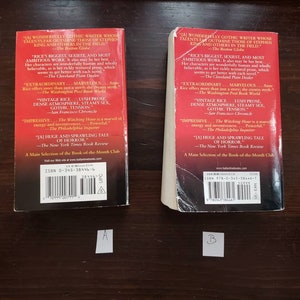May include: Two red paperback books with white text on the spine and back cover. The books are titled "The Witching Hour" by Anne Rice. The back cover includes quotes from reviews and the ISBN number.