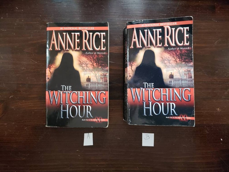 May include: Two paperback copies of "The Witching Hour" by Anne Rice, a #1 national bestseller. The books are in good condition and have a red, black, and white color scheme.