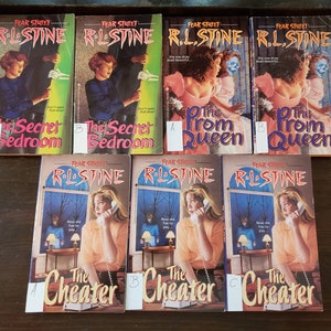 May include: A collection of nine paperback books from the Fear Street series by R.L. Stine. The books are all in the same style, with a black and white cover featuring a young person in a scary situation. The titles of the books are "The Secret Bedroom", "The Prom Queen", and "The Cheater".