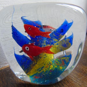 A Murano Paperweight, Aquarium with four fish, swimming around blue coral. Two red and two orange and white. made in the 1970s.