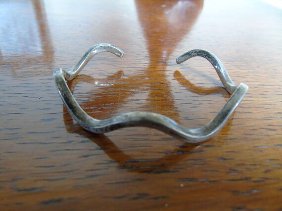 Two Bracelets. Silver thin wavy bangle, and maybe… - image 3