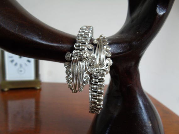 Two Bracelets. Silver thin wavy bangle, and maybe… - image 8