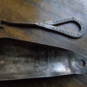 A vintage Kiwi shoehorn and a vintage Boot lacer