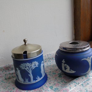 Two Cobalt blue Wedgewood pots with lids. One for jam or sugar, other with lid that is engraved Hair tidy but can be used for other purpose.