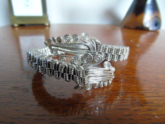 Two Bracelets. Silver thin wavy bangle, and maybe… - image 9