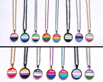 May include: A set of 10 necklaces with different colored chains and round pendants featuring various pride flags. The flags include the transgender, bisexual, lesbian, gay, pansexual, and asexual flags.