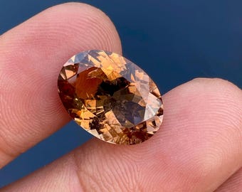 Naturalny turmalin owalny, fasetowany turmalin z Afryki do biżuterii. 7,79 ct. Turmalin Shampion Brown fasetowany owalny. 11,50 x 16 mm
