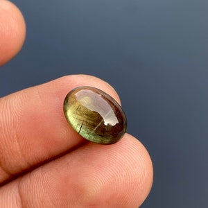 Peridot Rutile Gemstone Oval Cabochon, aaa peridot. UNIQUE PERIDOT RUTILE Rare Quality. Natural Peridot Gemstone, 5.35cts size 9x12.50mm