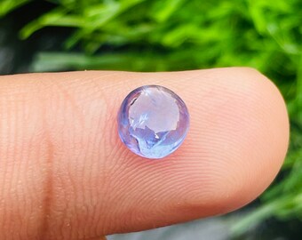 Cabujón de tanzanita. Tanzanita natural. AAA Tanzanita Brillo Increíble.Tanzanita Redonda. 6,50 mm. 1.50cts