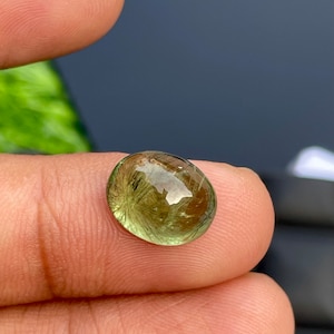 Peridot Rutile Gemstone Oval Cabochon, aaa peridot. UNIQUE PERIDOT RUTILE Rare Quality. Natural Peridot Gemstone, 6.30cts size 9.70x12mm
