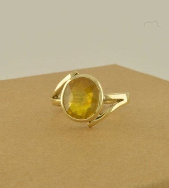 REAL GEMS 11.25 Ratti Natural Certified Yellow Sapphire (Pukhraj) Panchdhatu  Ring for Men & Boys : Amazon.in: Fashion