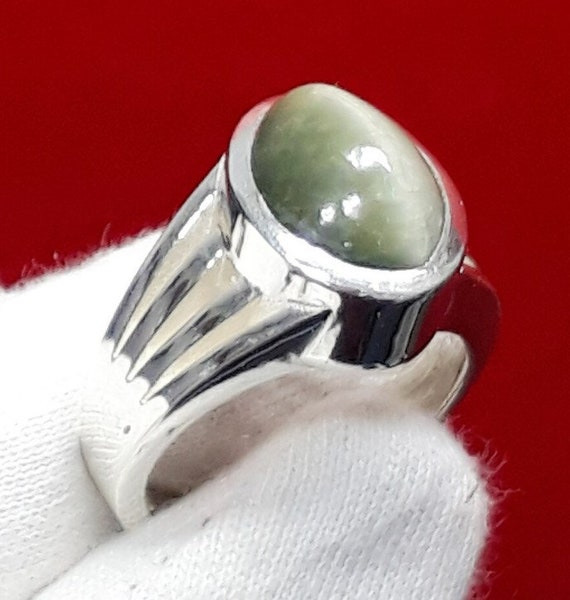 Cat eye stone and diamond ring , set in platinum | Cat eye jewelry, Cats  eye ring, Gold wedding jewelry