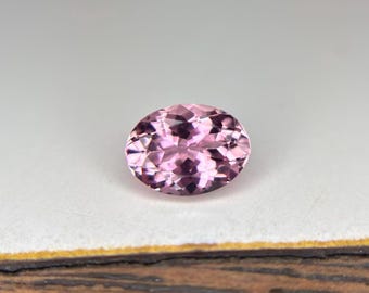 Peach Pink Tourmaline: .85 CT Oval Gemstone, Loupe Clean