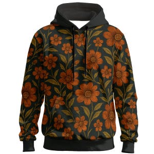 Pode incluir: Um moletom preto com um padrão floral de flores laranja e folhas verdes. O moletom tem capuz e punhos pretos. O design floral cobre toda a frente e as costas do moletom.
