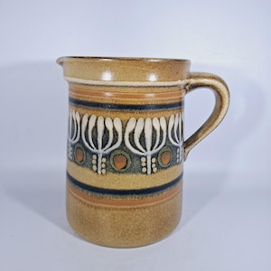 Brown ceramic jug