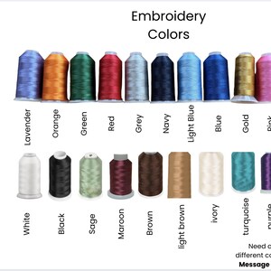 May include: A color chart of embroidery thread spools in various colors, including lavender, orange, green, red, grey, navy, light blue, blue, gold, and pink. Additional colors include white, black, sage, maroon, brown, light brown, ivory, turquoise, and purple.