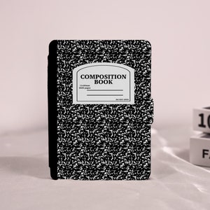 May include: A composition book-style case with a black and white speckled design. The case features a white label with the words "COMPOSITION BOOK" and the dimensions 11x30mm and 2020 pages. The words "DO NOT OPEN" are also visible.