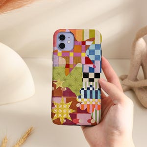 May include: A rectangular phone case featuring a vibrant collage of multicoloured patterns, including checkered squares, various star shapes, and a stylised flower. The design incorporates shades of yellow, pink, green, blue, and red in a patchwork layout.