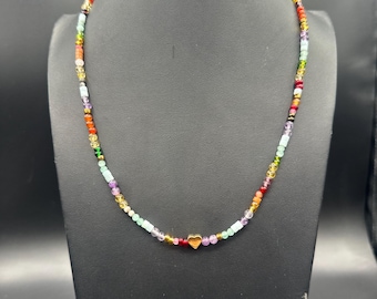 Colorful necklace with tiny gold plated heart