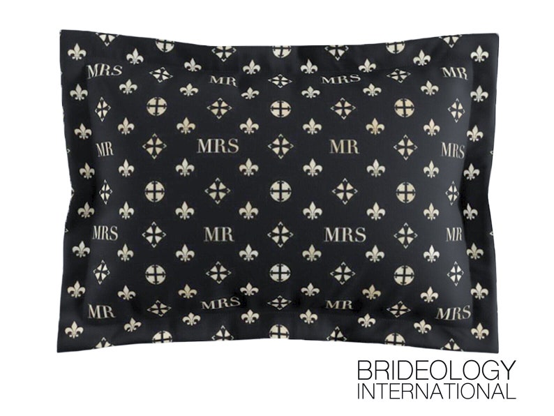 May include: Black pillowcase with a repeating pattern of gold fleur-de-lis and the words "MR" and "MRS".