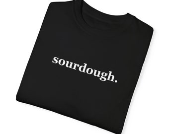 May include: Black t-shirt with white text that reads "sourdough."