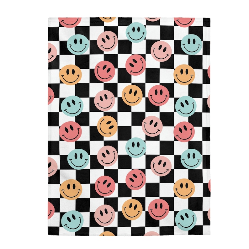 May include: Checkerboard pattern in black and white with a repeating pattern of colorful smiley faces in blue, yellow, pink, and orange.