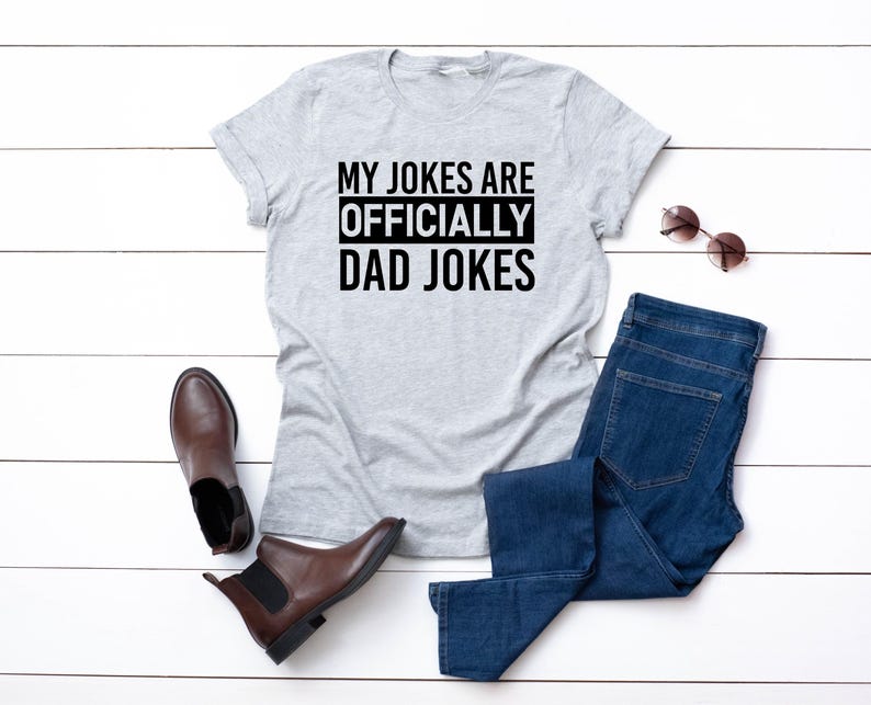 a t - shirt that says, my jokes are officially dad jokes