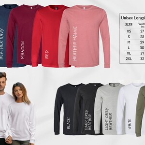 a man and woman standing next to each other wearing long sleeve shirts