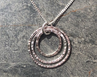 Silver 3 ring textured  pendant
