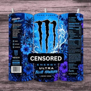 May include: A cylindrical tumbler featuring a blue tropical design with palm trees, hibiscus flowers, and the Monster Energy logo. The text reads Unleash the Ultra Beast, Zero Sugar, Ultra Blue Hawaiian, and includes a nutrition facts label and barcode.