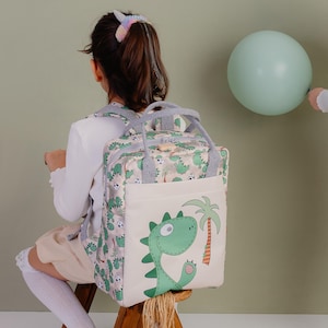 Sac à dos sur le thème des dinosaures pour enfants | Imperméable et lavable | Parfait pour l'école | 5-11 ans | Durable et mignon | 34x26x13 cm