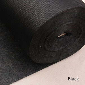 May include: A roll of black landscape fabric, a material used to suppress weeds and retain moisture in gardens.
