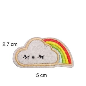 May include: A white felt cloud with a rainbow embroidered on top. The cloud has a smiling face with closed eyes. The rainbow is red, orange, yellow, green, blue, indigo, and violet. The patch measures 5 cm wide and 2.7 cm high.