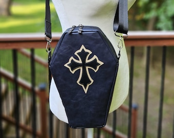Black Coffin Shaped Crossbody Bag with Cross Applique and Raven Themed Zipper Pulls and Lining