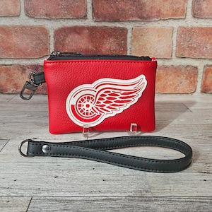 Minibolso de mano de los Detroit Red Wings, regalo para aficionados al hockey de Detroit, monedero con logotipo deportivo, llavero rojo, blanco y negro.