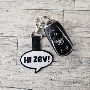 May include: A rustic wooden sign with the text "Welcome to our home" in a handwritten style. The sign features a distressed finish and a simple, inviting design, perfect for entryway decor.