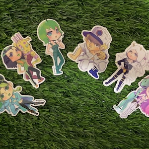 May include: Set of six colorful cartoon character stickers featuring anime-style characters with green, blue, pink, white, and yellow accents.