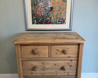 A Vintage stripped pine chest of drawers