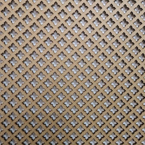 May include: A brown wooden panel with a repeating pattern of cut-out four-pointed stars. The stars are arranged in a diagonal pattern.