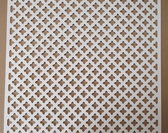 May include: White metal decorative grille with a repeating diamond pattern. The grille has a square shape and is made of thin metal.