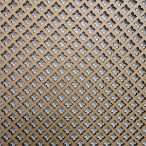 May include: A brown wooden panel with a repeating pattern of cut-out four-pointed stars. The stars are arranged in a diagonal pattern.