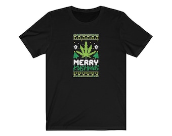 Merry Kushmas Holiday 420 Graphic T-Shirt - Play on Words Christmas Weed Graphic Tee in Numerous Sizes & Colors | Holiday Gift for Smokers